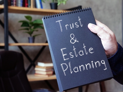 Trust and Estate Planning on a notebook