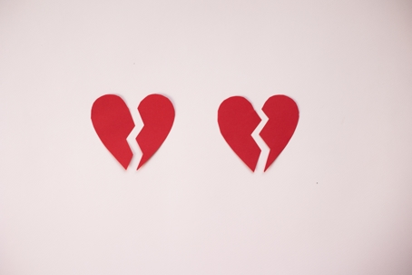 two red broken hearts